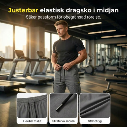 👖50 % RABATT🏃 Arbetsbyxor i fleece | Dragsko i midjan · Slitstarkt polyester · Avsmalnande ben · Flera fickor