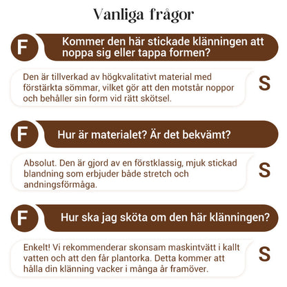 Damklänning med dragkedja, slag och förlängda ärmar i stickat material, med fiskstjärtkant.