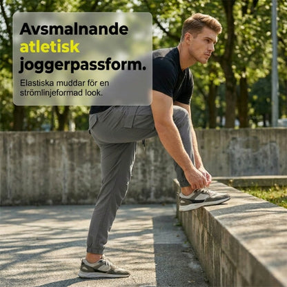 👖50 % RABATT🏃 Arbetsbyxor i fleece | Dragsko i midjan · Slitstarkt polyester · Avsmalnande ben · Flera fickor