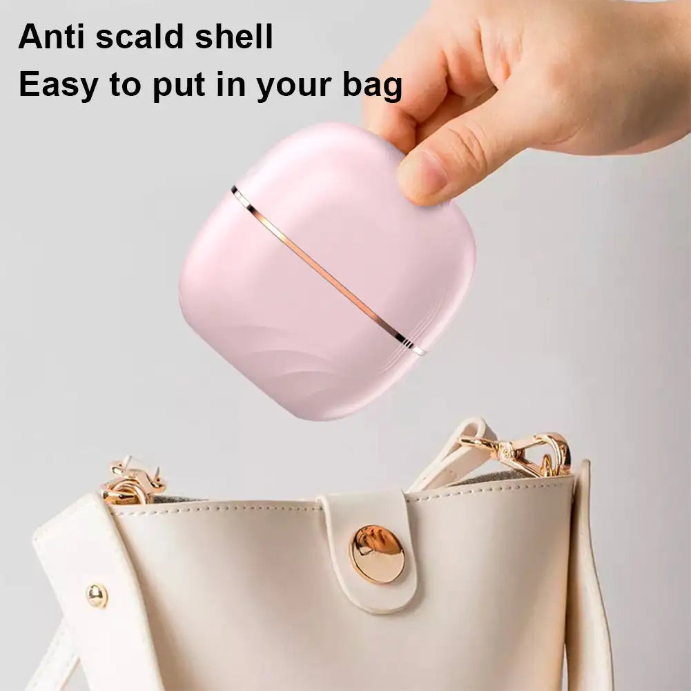 Bärbar värmehårborste