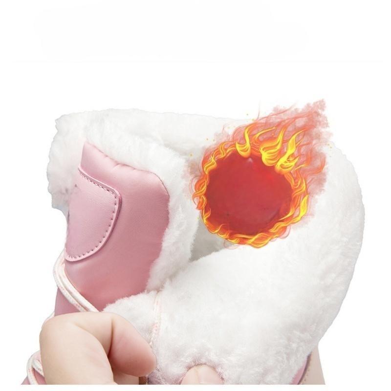Varma snöstövlar för kvinnor för vinterbruk.