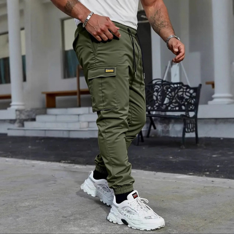 👖50 % RABATT🏃 Arbetsbyxor i fleece | Dragsko i midjan · Slitstarkt polyester · Avsmalnande ben · Flera fickor