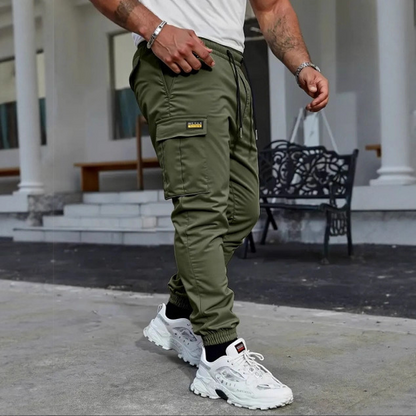 👖50 % RABATT🏃 Arbetsbyxor i fleece | Dragsko i midjan · Slitstarkt polyester · Avsmalnande ben · Flera fickor