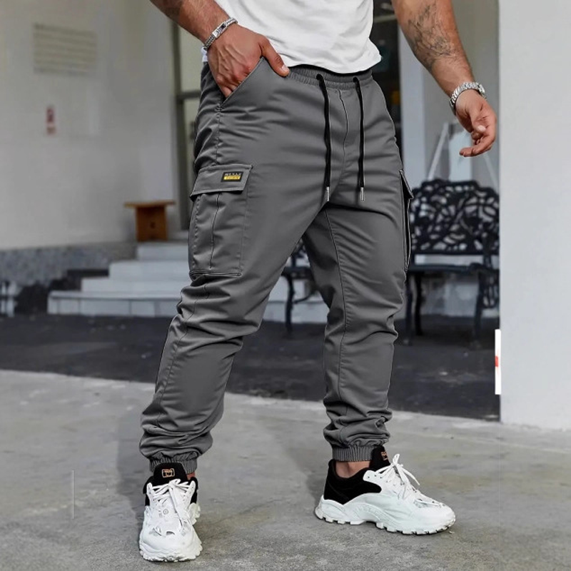 👖50 % RABATT🏃 Arbetsbyxor i fleece | Dragsko i midjan · Slitstarkt polyester · Avsmalnande ben · Flera fickor