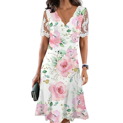 Damklänning med blommönster och spetsärmar