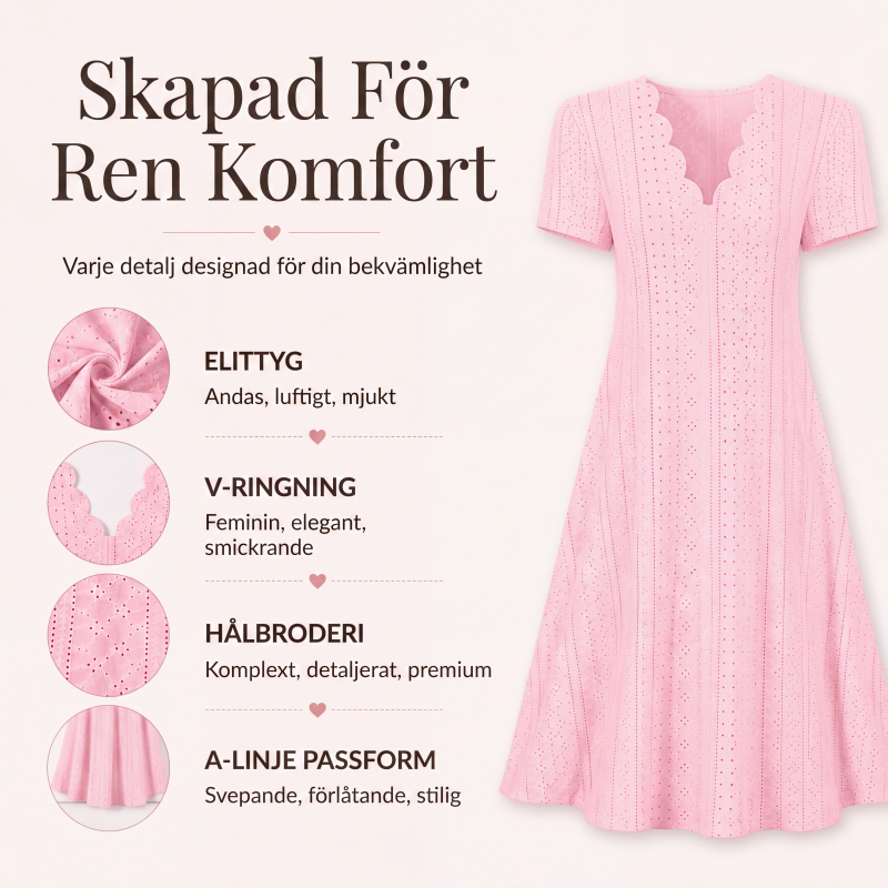 Damklänning med bågformad v-ringning och hålsömmar